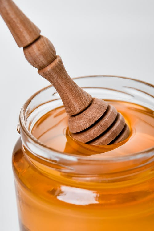 Pure honey in a jar